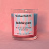 Image of pink and blue bubblegum candle on a pink background